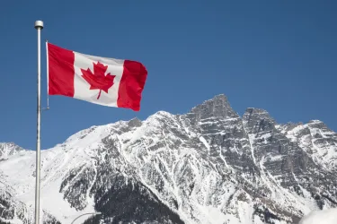 Canada flag in mountains