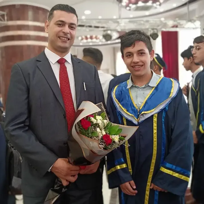 Ahmed at graduation ceremony