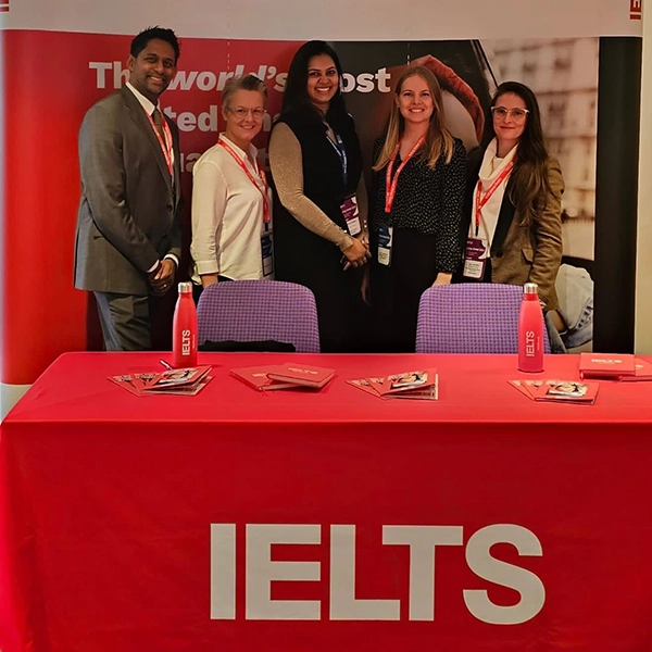 IELTS stand at the Going Global conference with branding and display materials