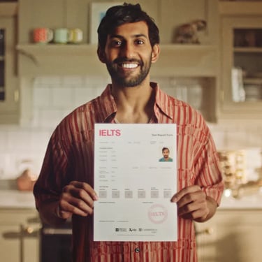 I've got this advertising campaign - man holding IELTS certificate