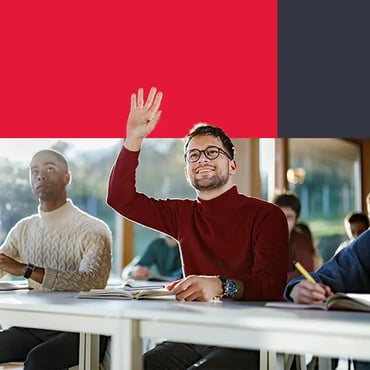 Student raising hand in university classroom webp