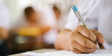 Close up of hand writing in an exam
