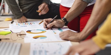 Students reviewing data and charts