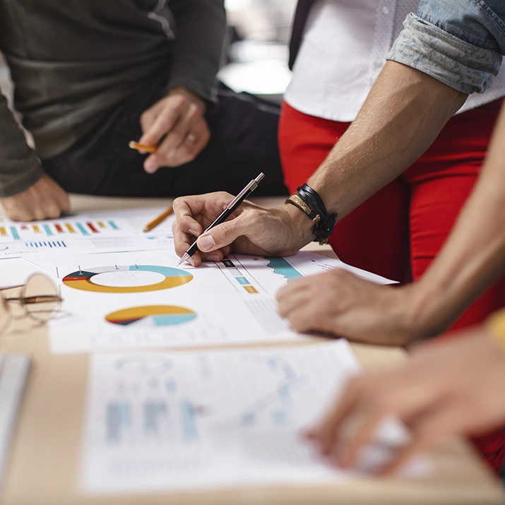 Students reviewing data and charts