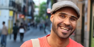 Smiling man on city street