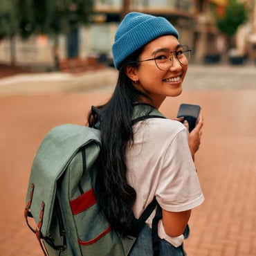 Student walking campus backpack - right