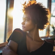 Woman at sunset - left