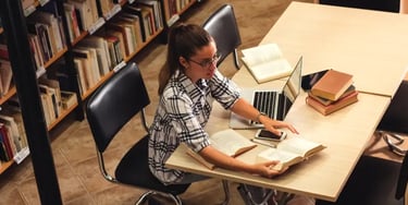 Female student studying in the library
