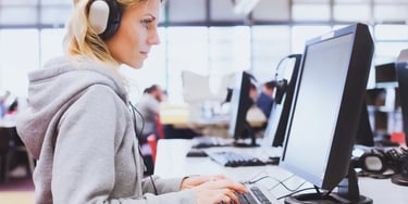 Female test taker using computer - right
