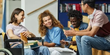 Group of diverse students in library setting