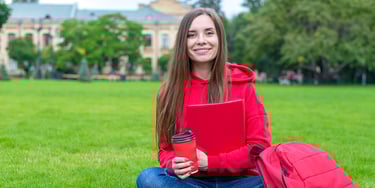 Student studying outdoors university campus