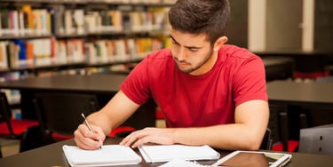 Man studying in library - left