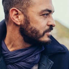 Man looking right outdoors