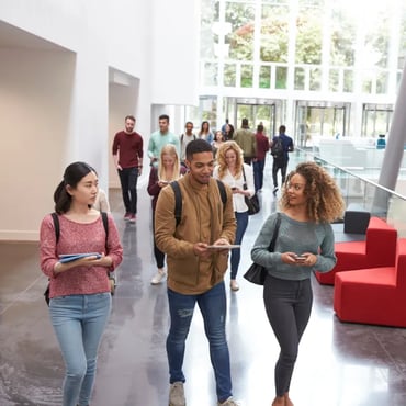 Students walking through university building