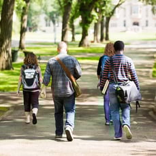 Students walking on campus path
