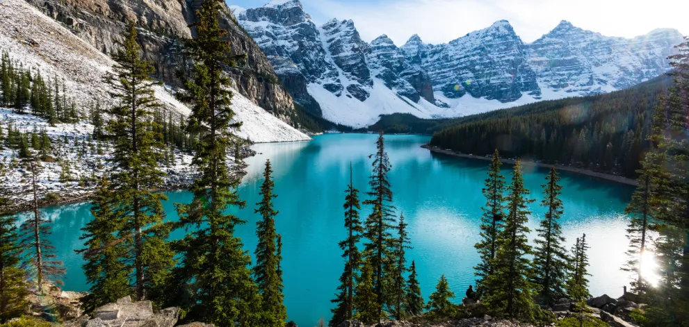 Scenic view of Moraine Lake in Banff National Park, Canada, with turquoise water and snow-capped mountains